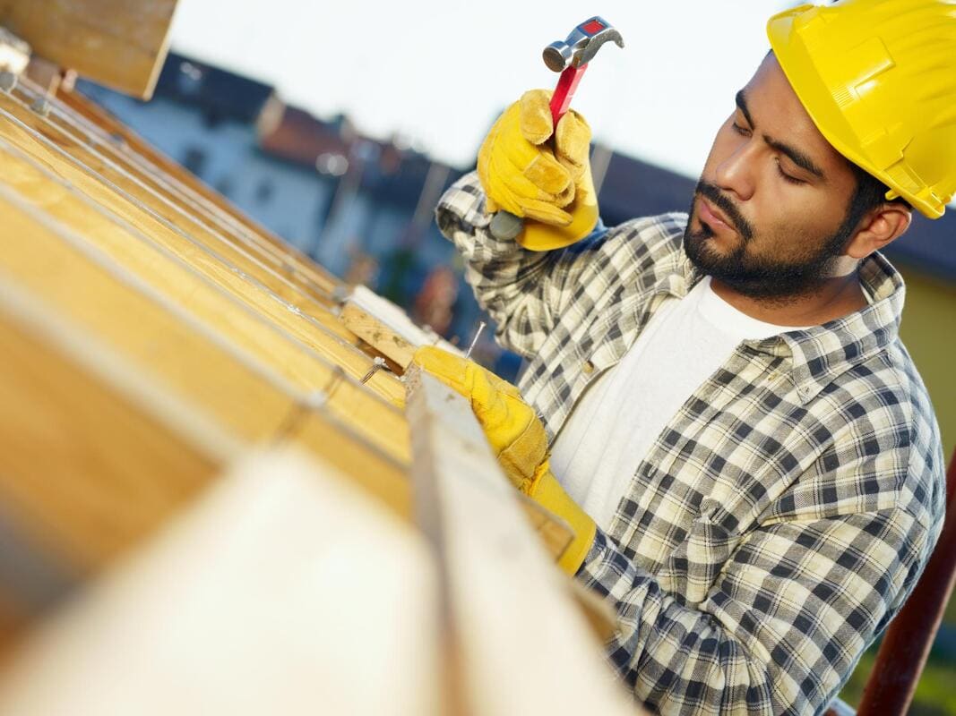 Exterior fascia repair at a roof edge